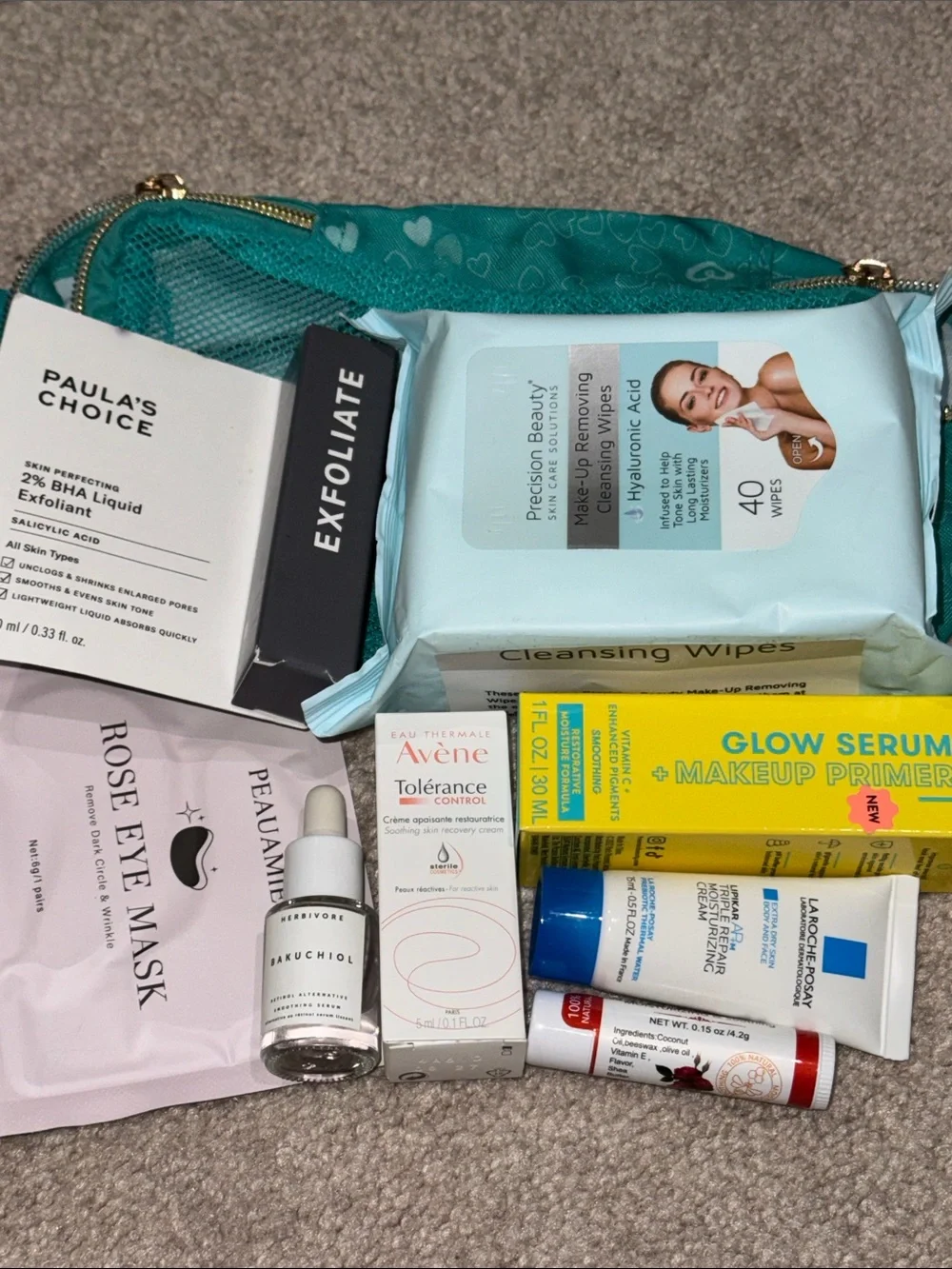 Paula's Choice Skincare Set with Teal Pouch and Assorted Essentials
